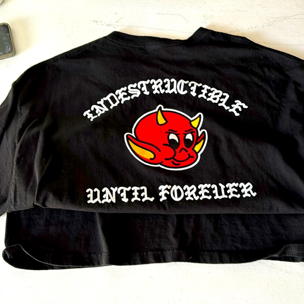 Indestructible brand shirt
